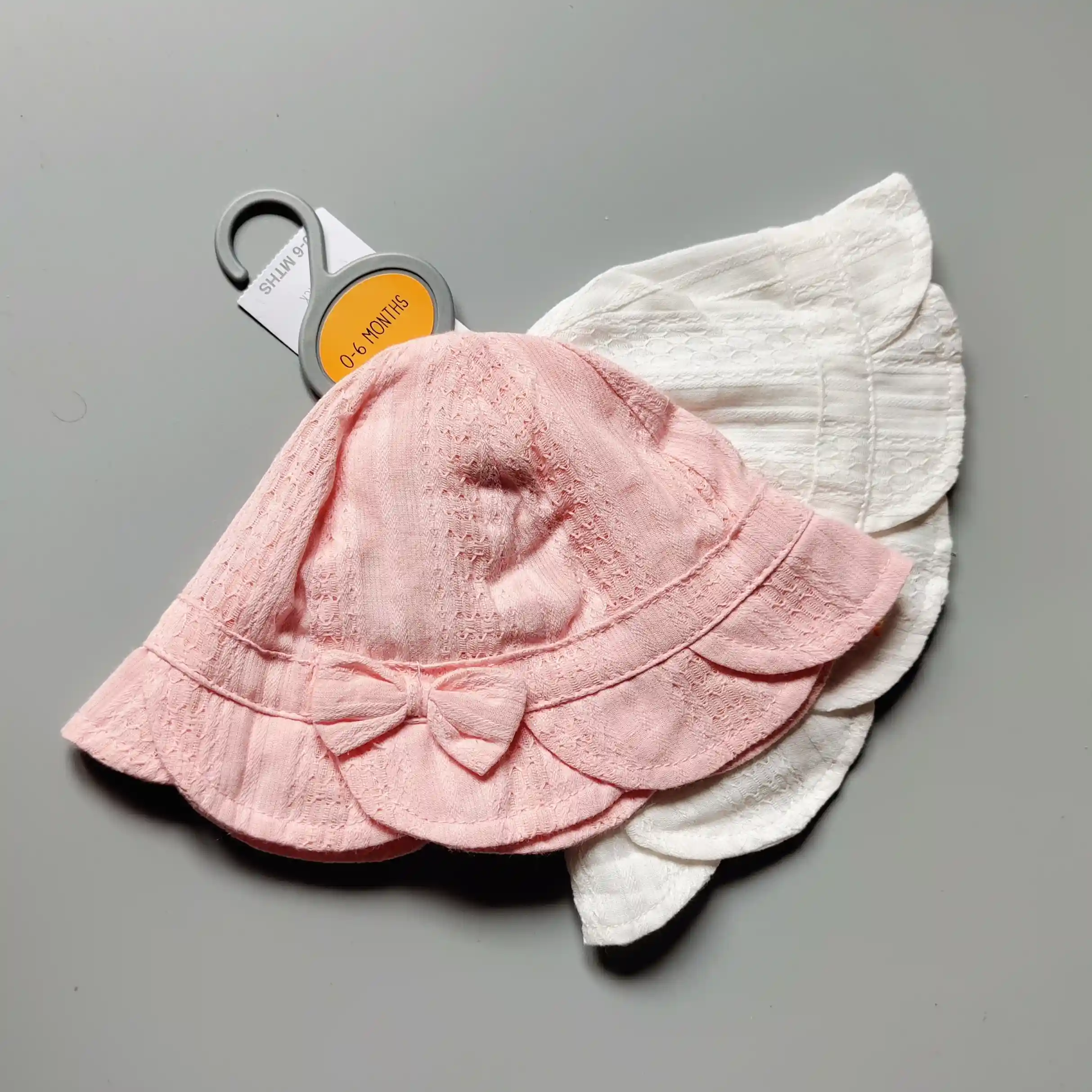 Set dvou kloboučků Matalan vel. 68