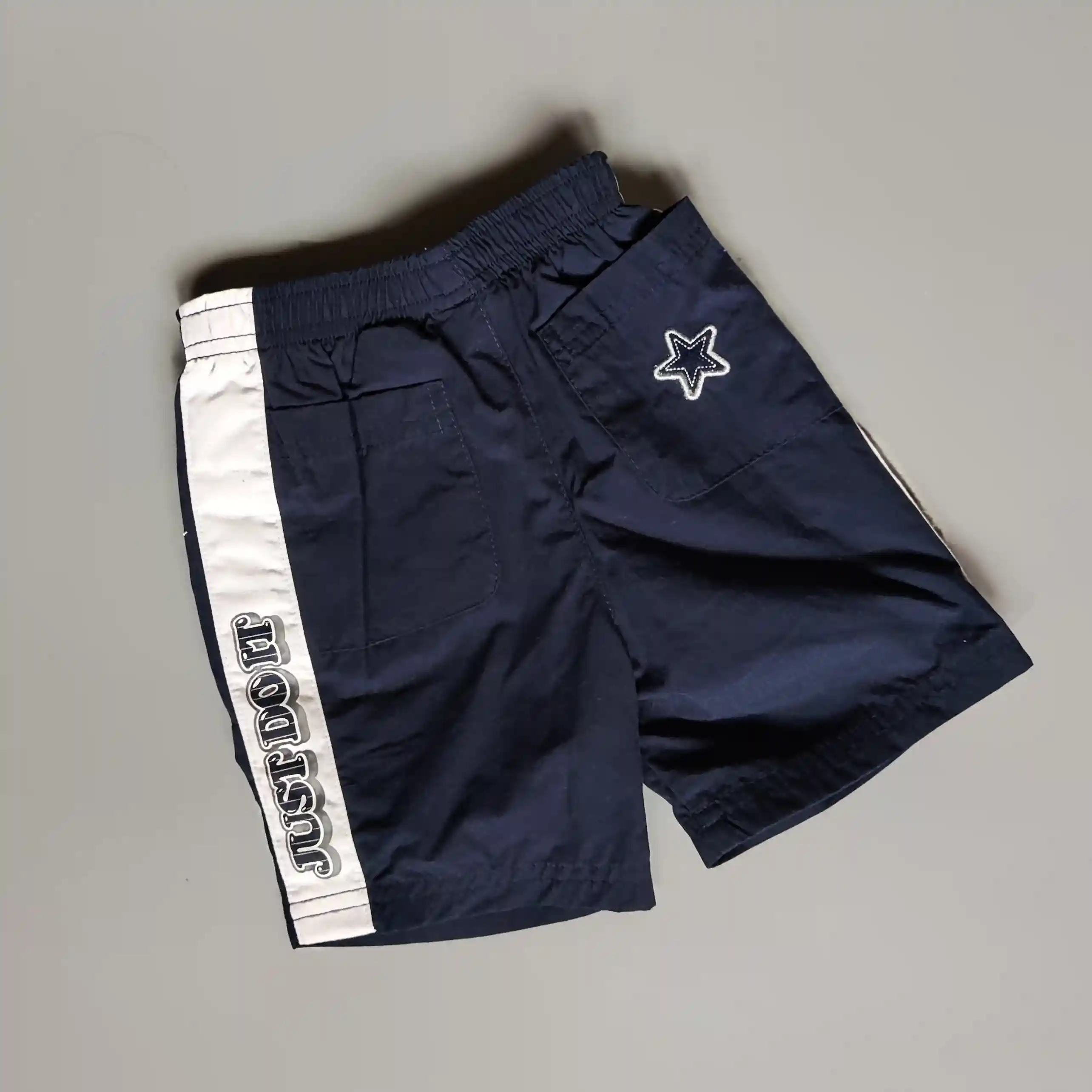 Plátěné kraťasy Nike vel. 74