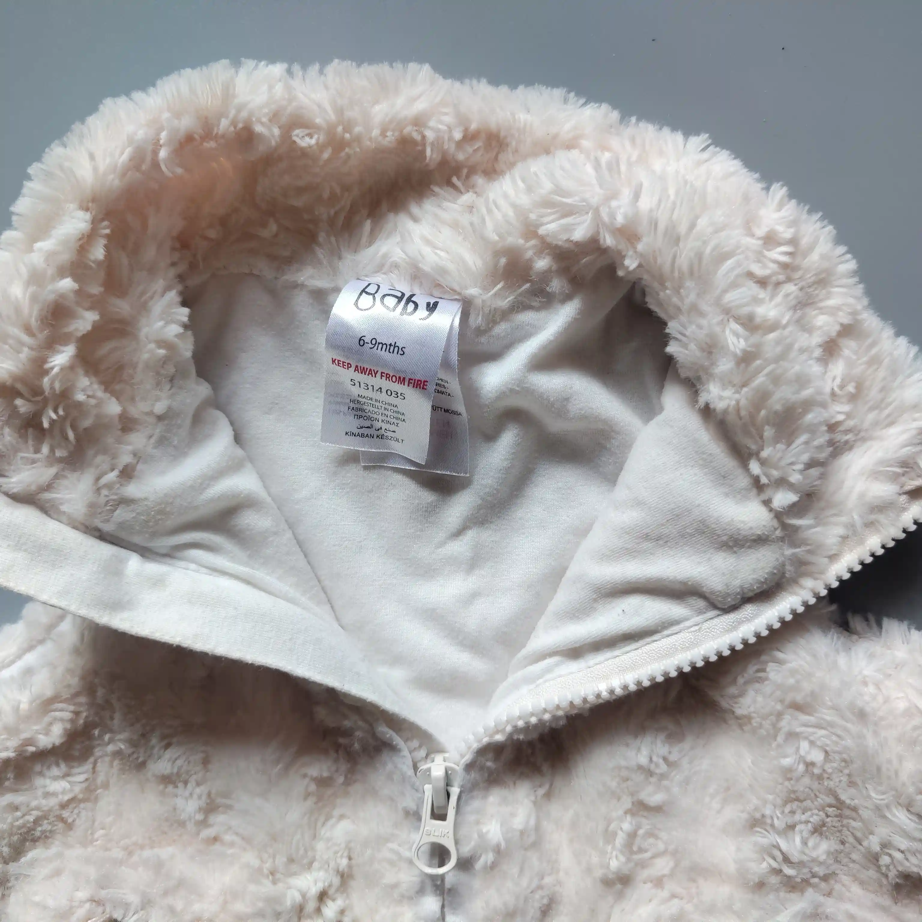 Kožíšková vestička Baby vel. 74 krémová