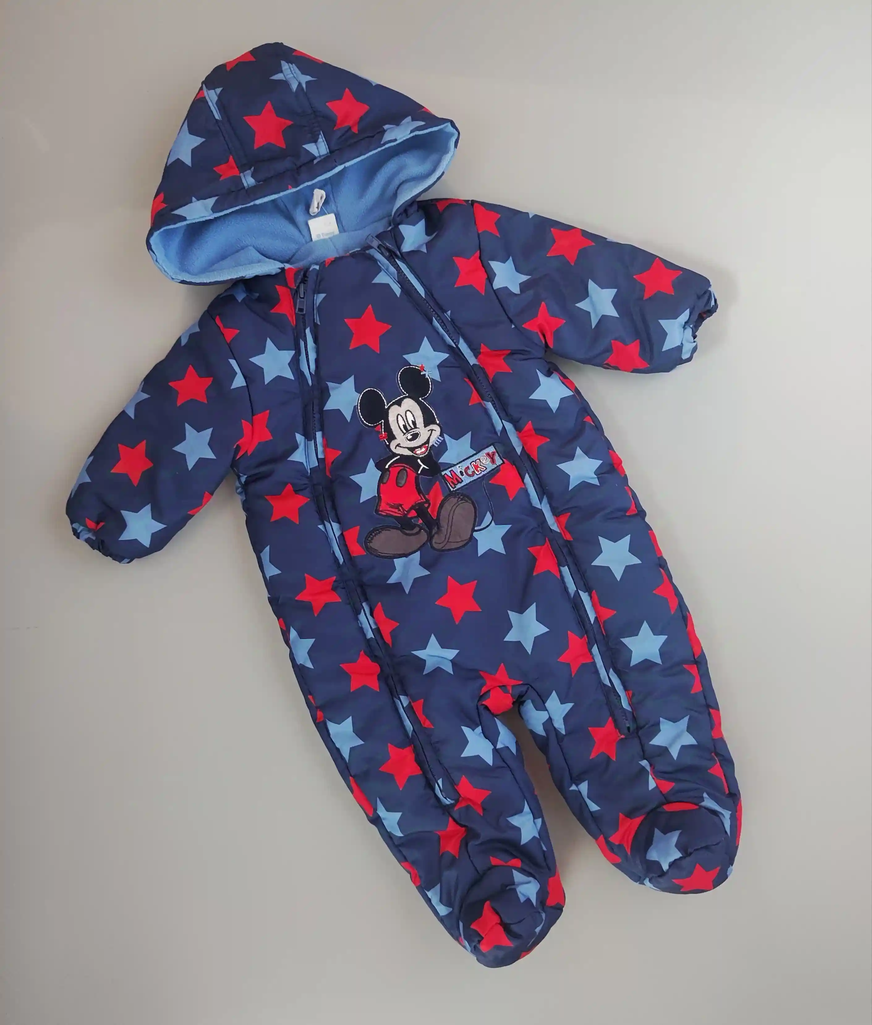 Kombinéza Disney vel. 68 modrá s hvězdami a Mickey Mousem