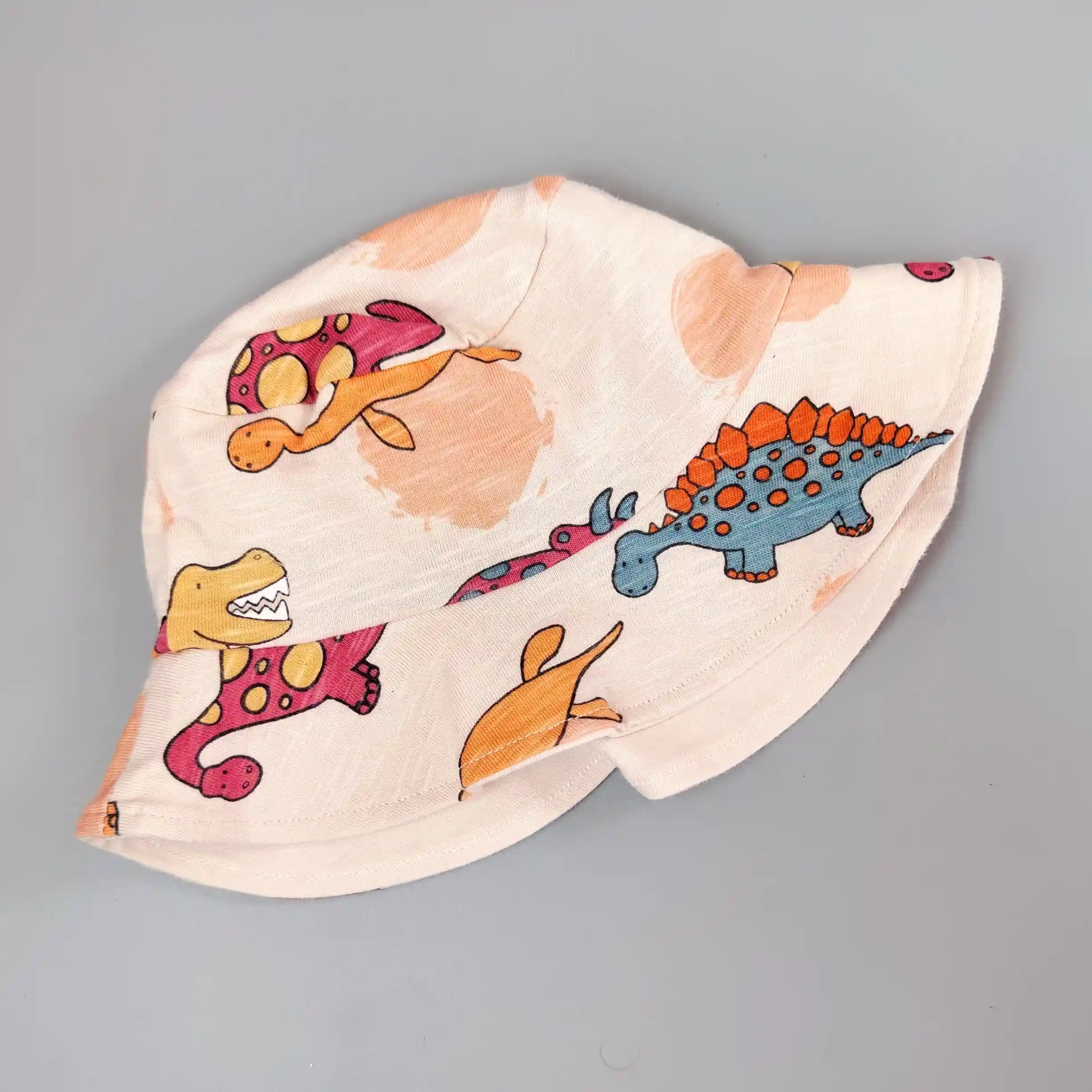 Bavlněný klobouček George vel. 68 krémový dino