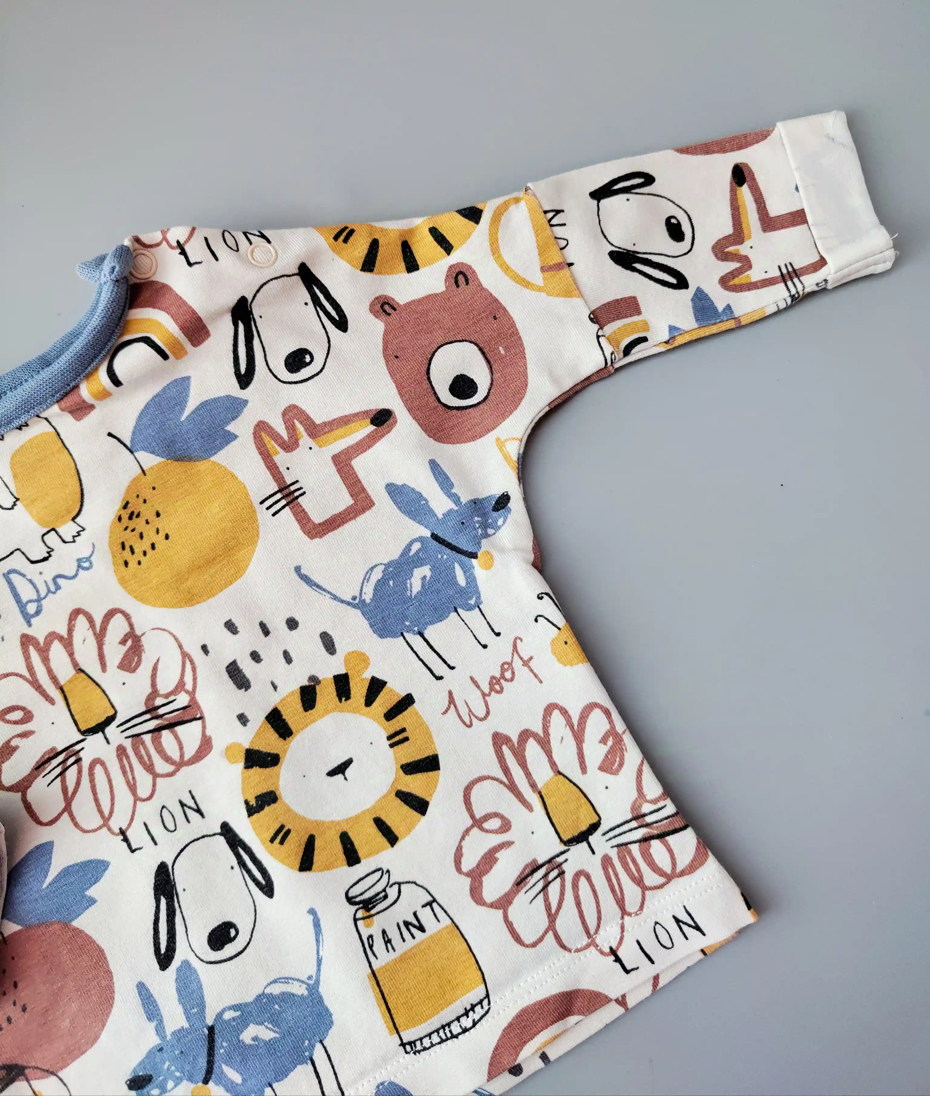 Tričko Next vel. 56 krémové se zvířátky