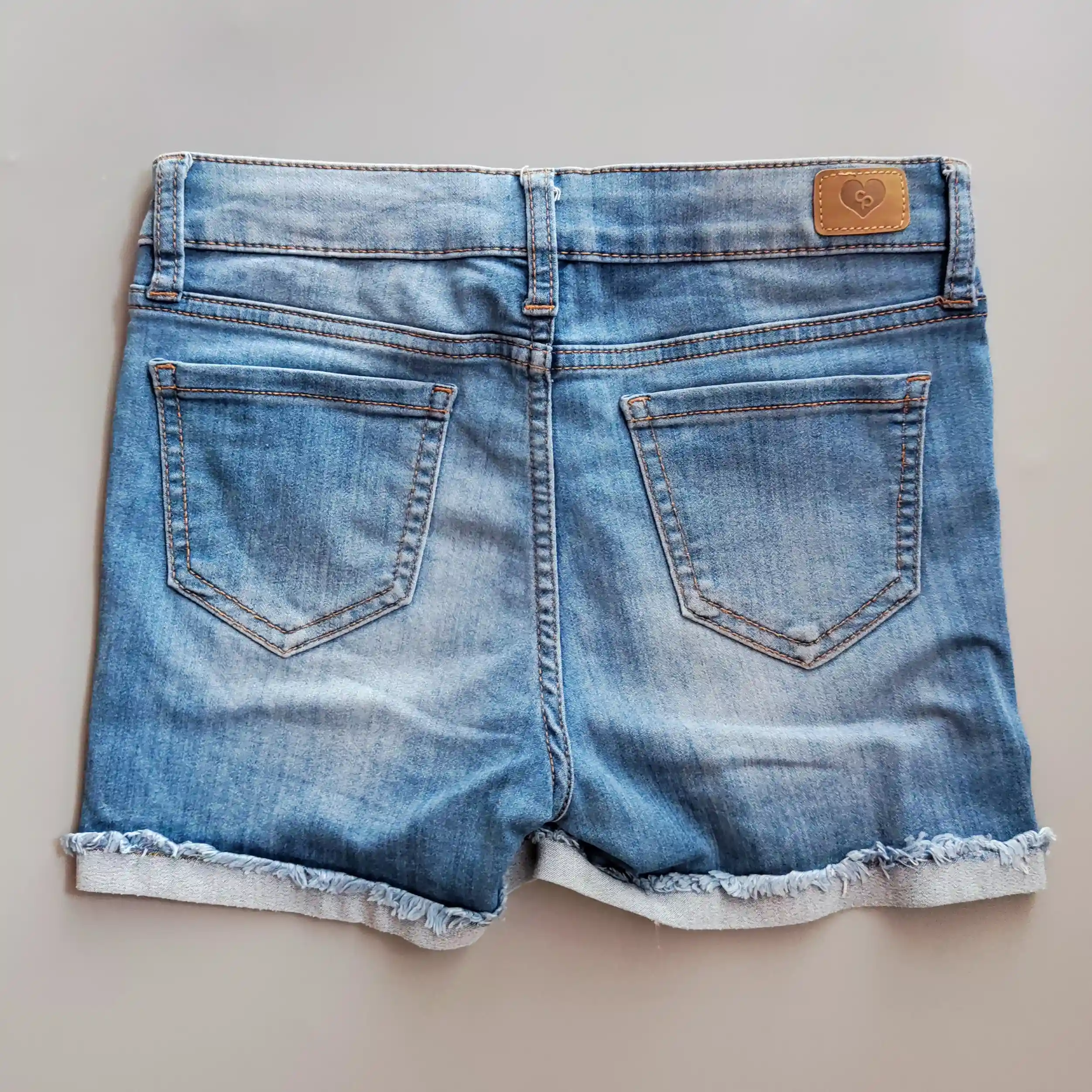 Džínové šortky Celebrity Pink vel. 164 světle modré