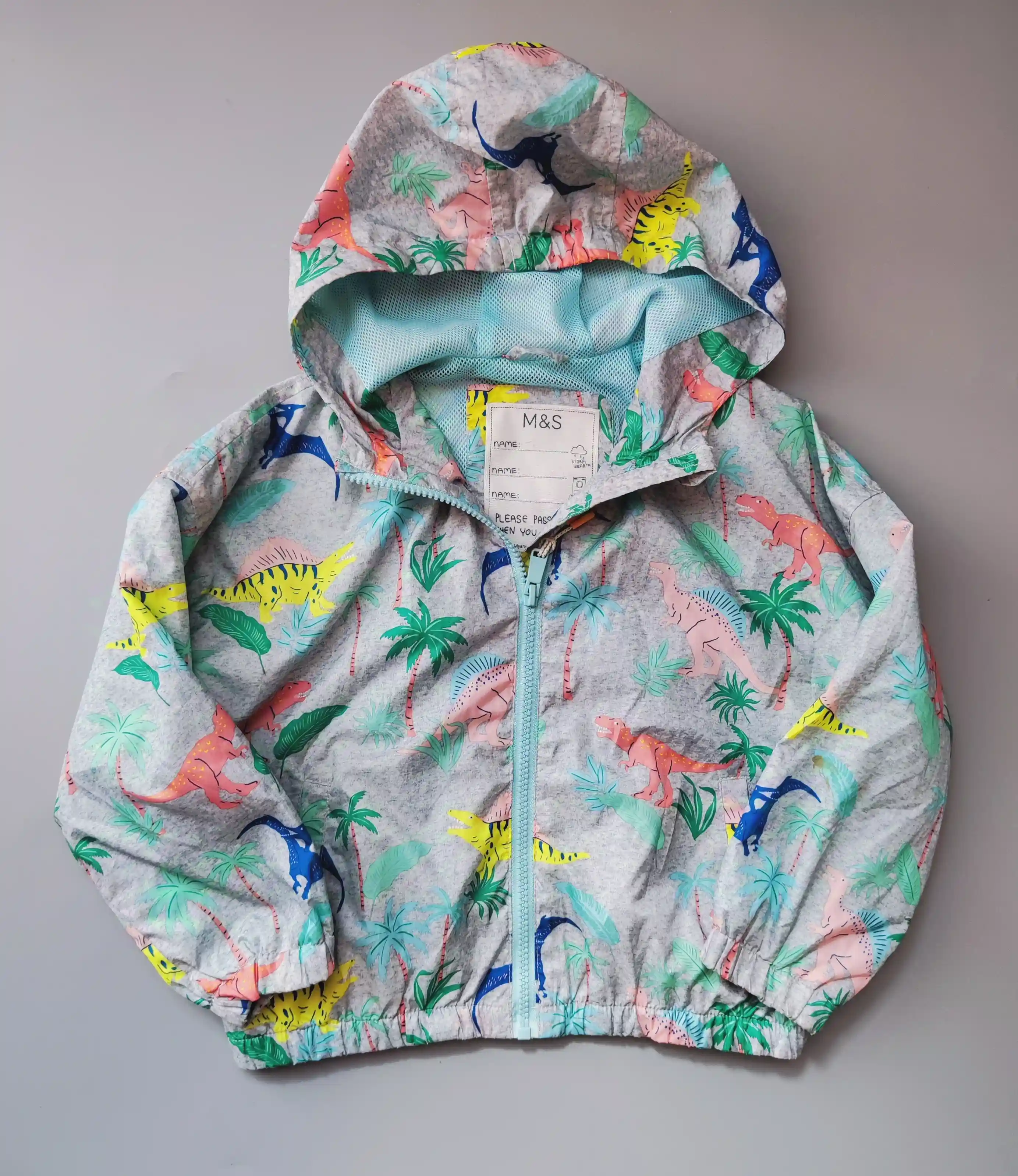 Větrovka M&S vel. 110 šedá s barvenými dinosaury