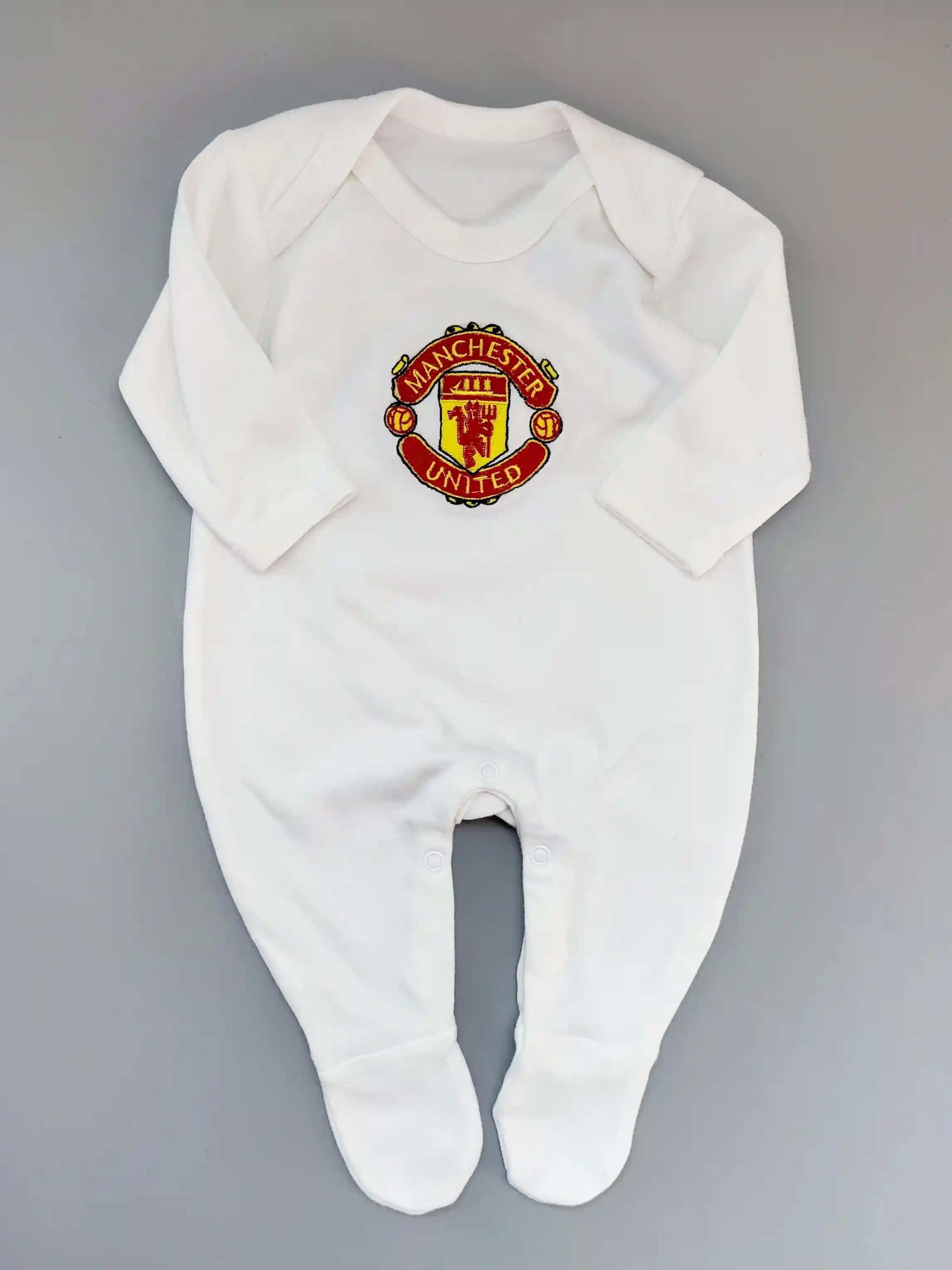 Overal Manchester United vel. 62 bílý