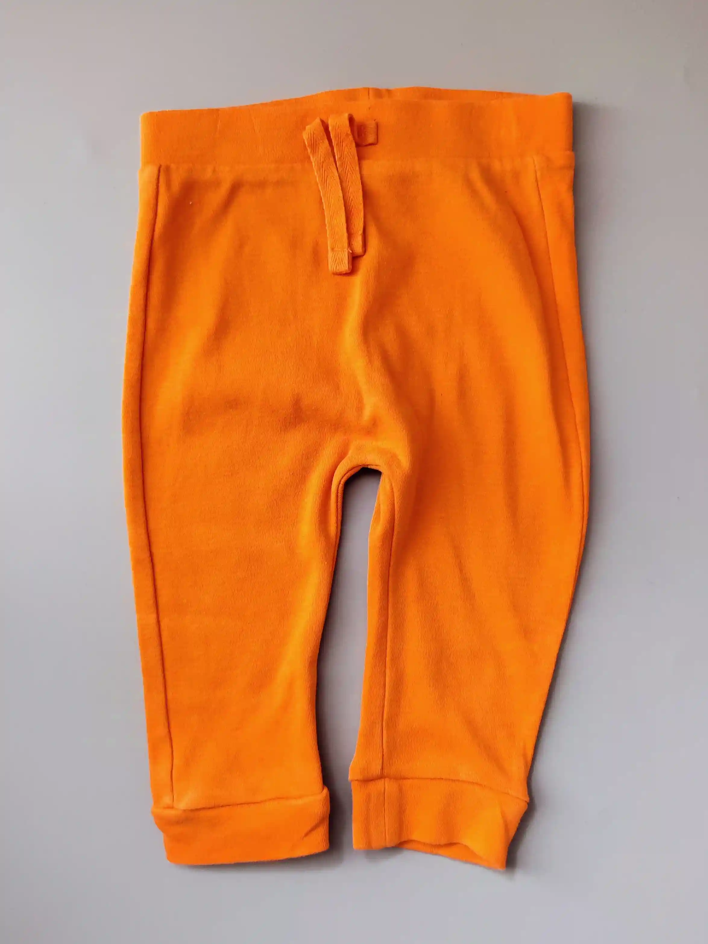 Bavlněné tepláky George vel. 74 oranžové