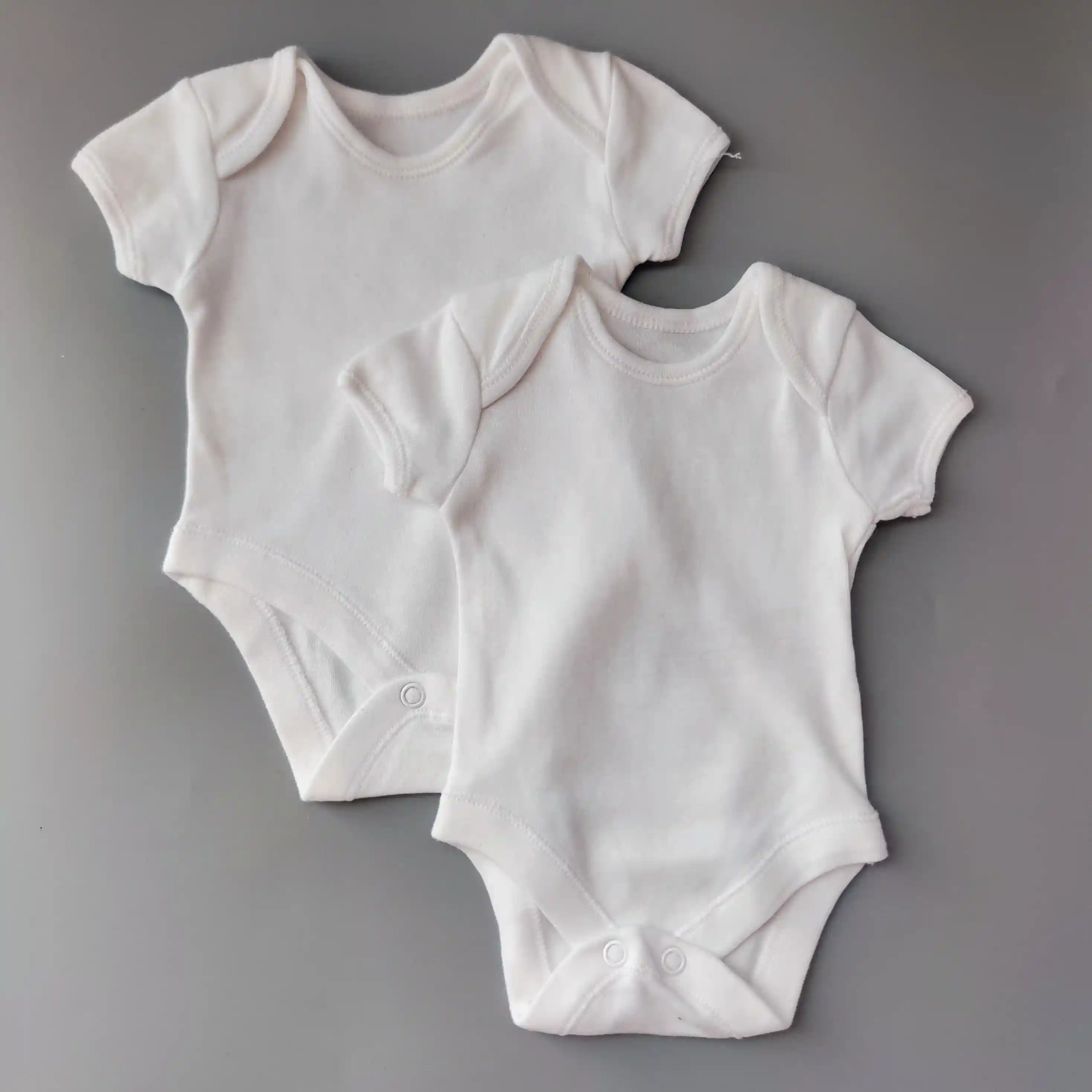 Set dvou body Primark vel. 50 bílé krátký rukáv
