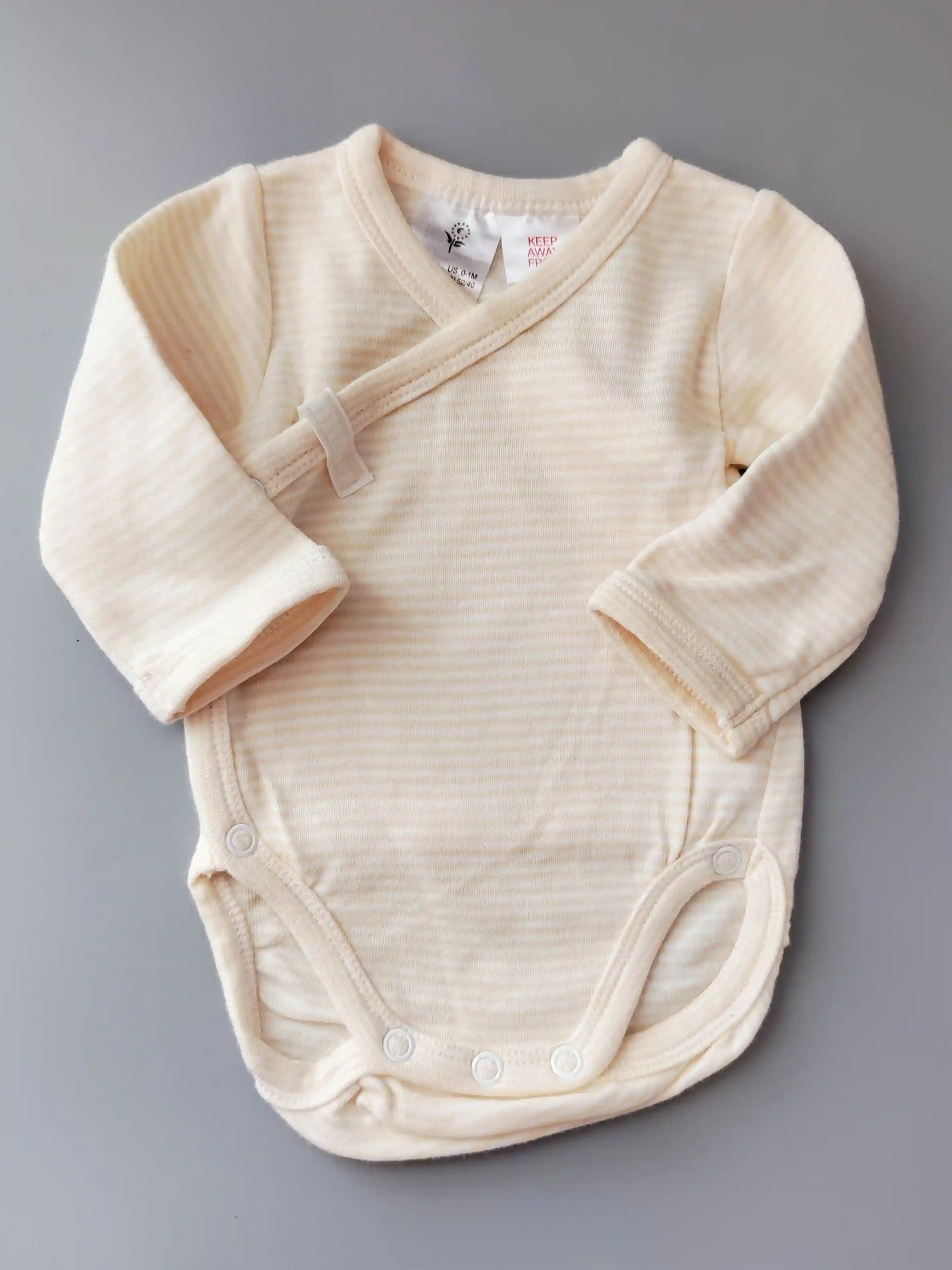 Zavinovací body H&M vel. 50 žlutobílé proužkované