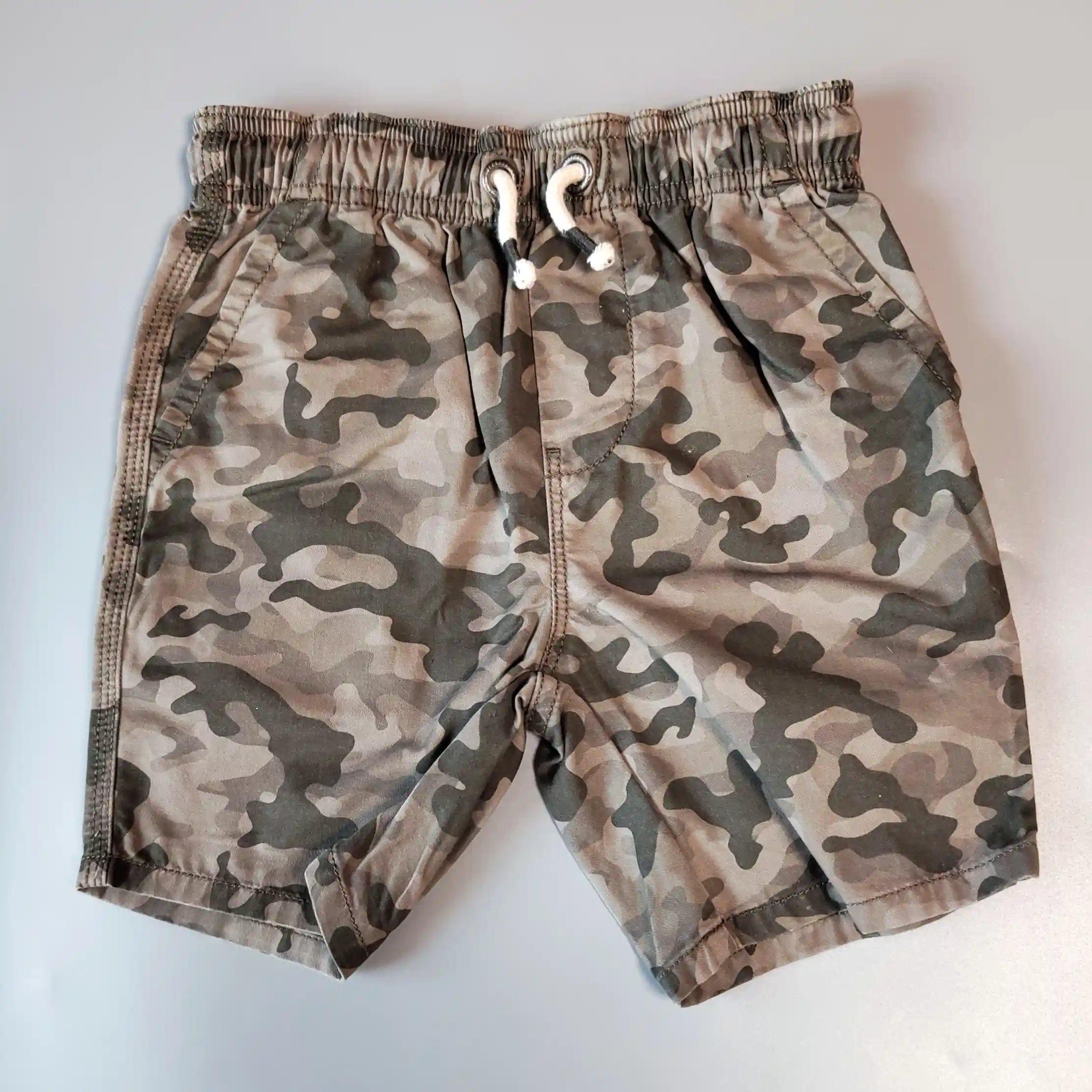 Kraťasy Next vel. 116 khaki maskáčové