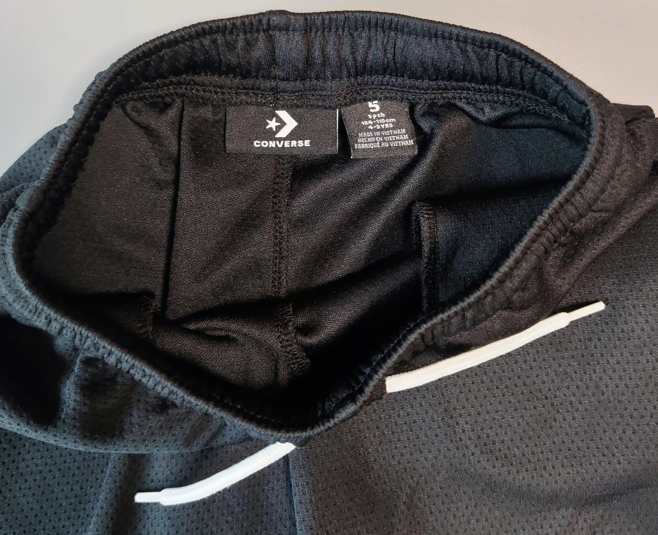 Funkční kraťasy Converse vel. 110 černé s pruhy