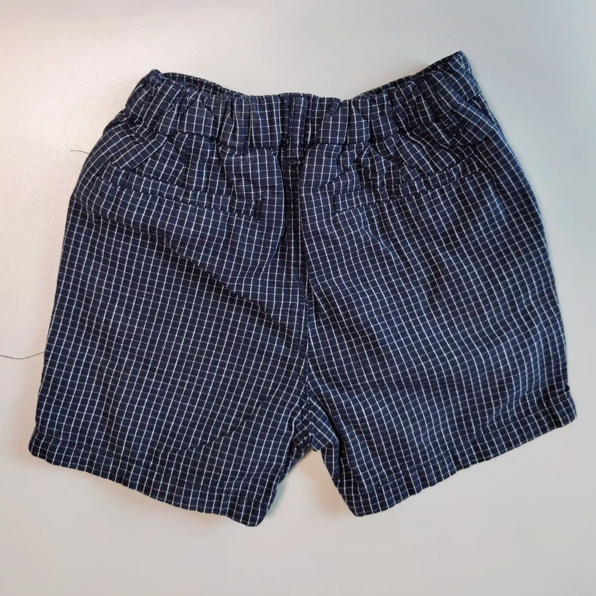 Elegantní chino kraťasy Next vel. 92 tmavě modré kostkované