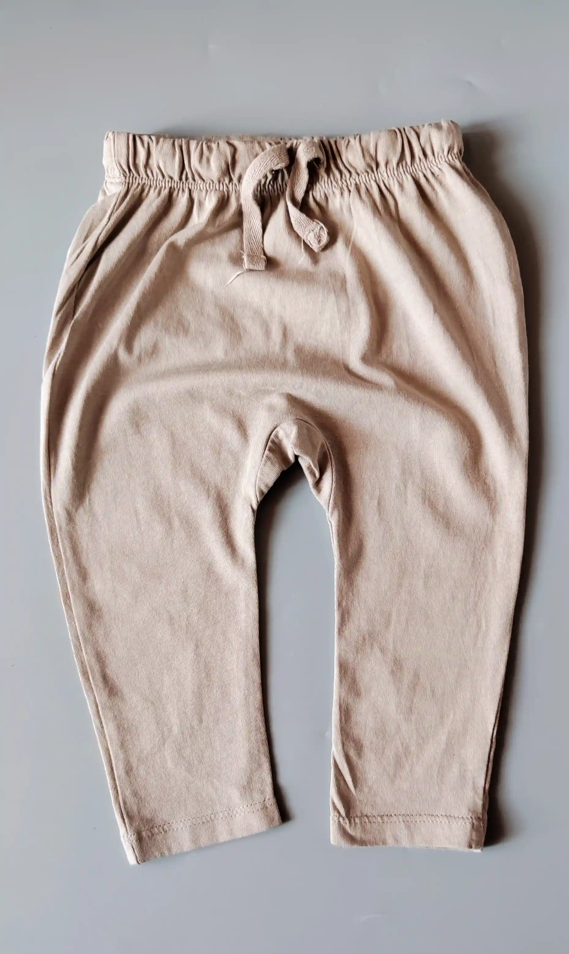 Bavlněné tepláčky H&M vel. 80 světle béžové