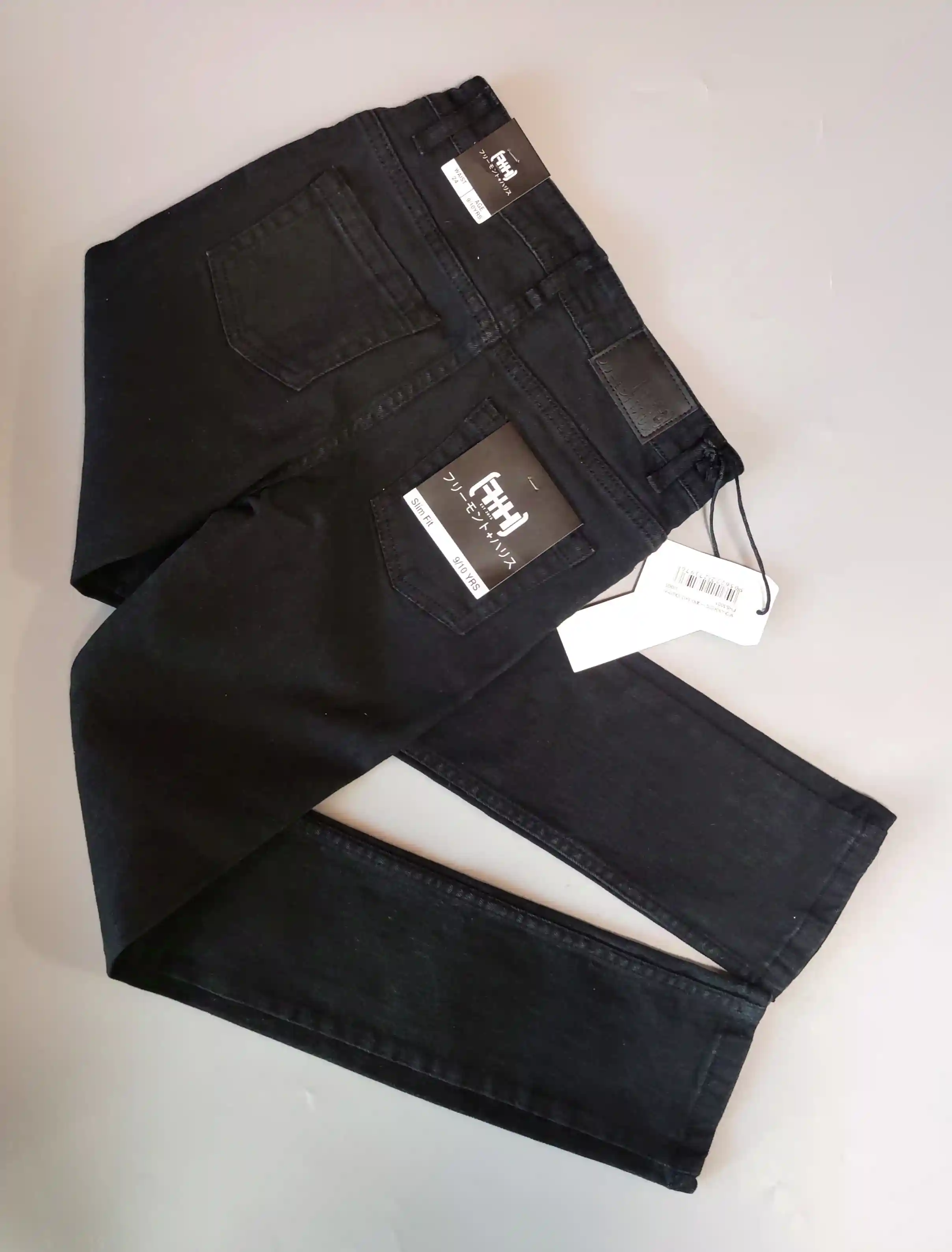 Černé slim fit džíny vel. 140