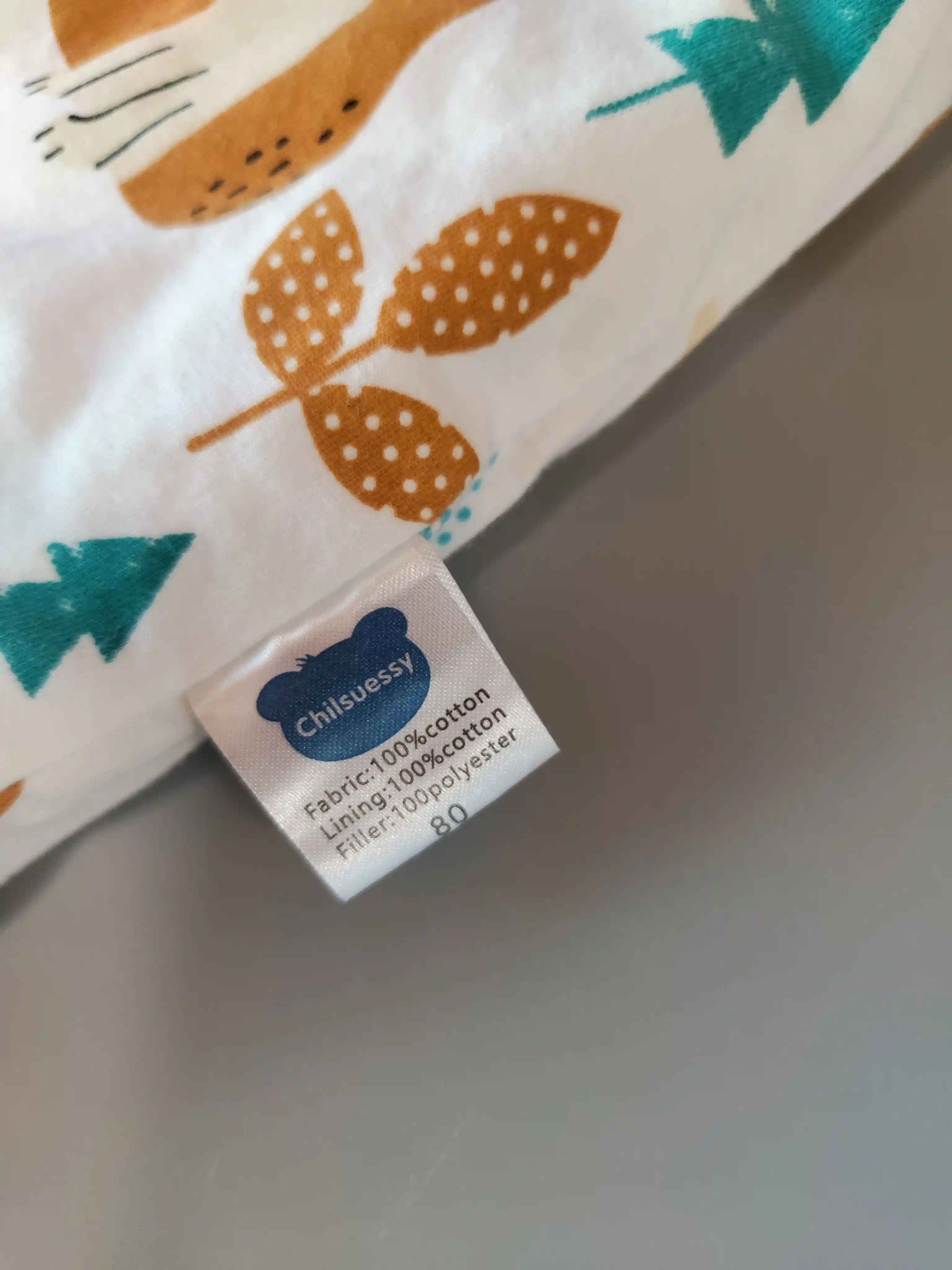 Zateplený spací vak s nohavicemi Chilsuessy vel. 80 bílý a tyrkys se zvířátky