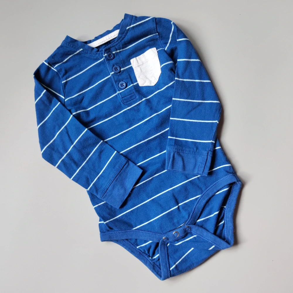 Body s knoflíčky a kapsou Baby vel.80