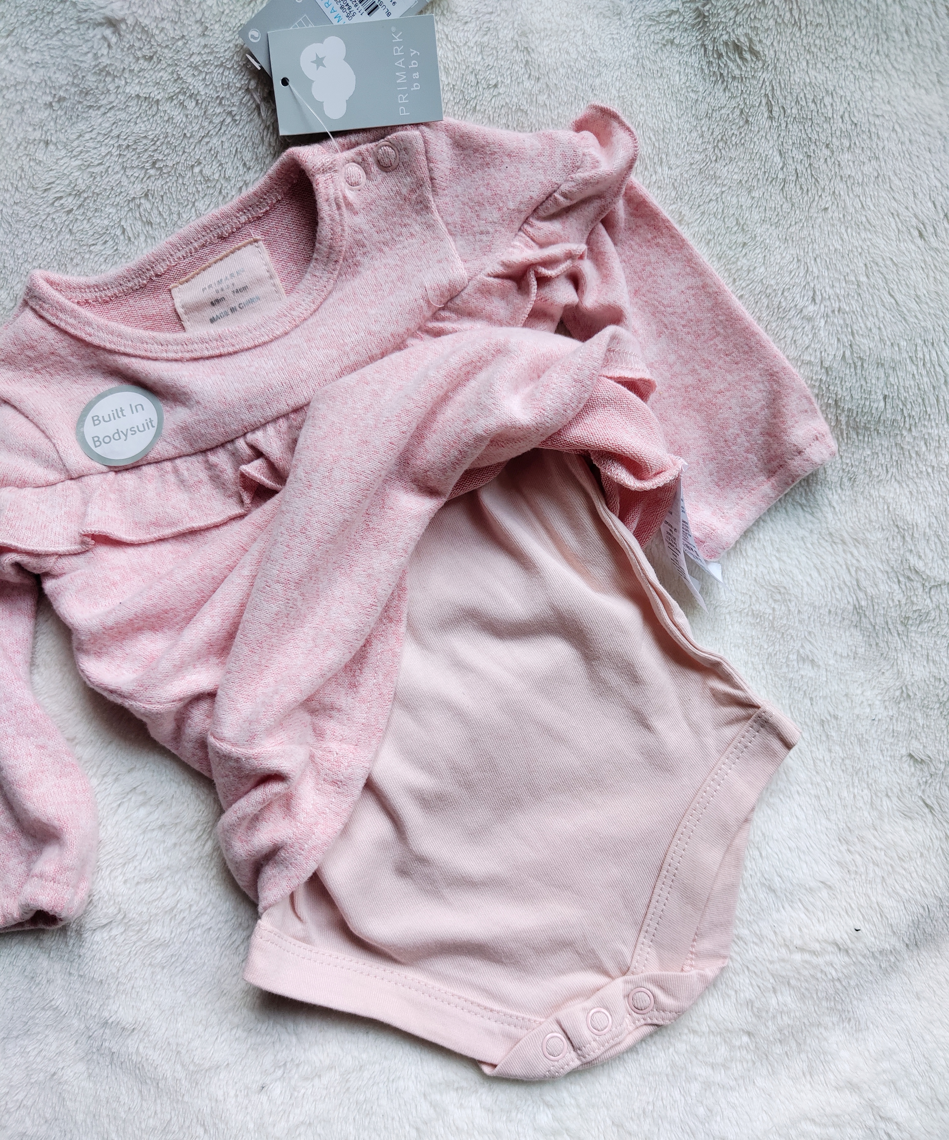 Úpletové šaty s všitým body Primark vel. 74