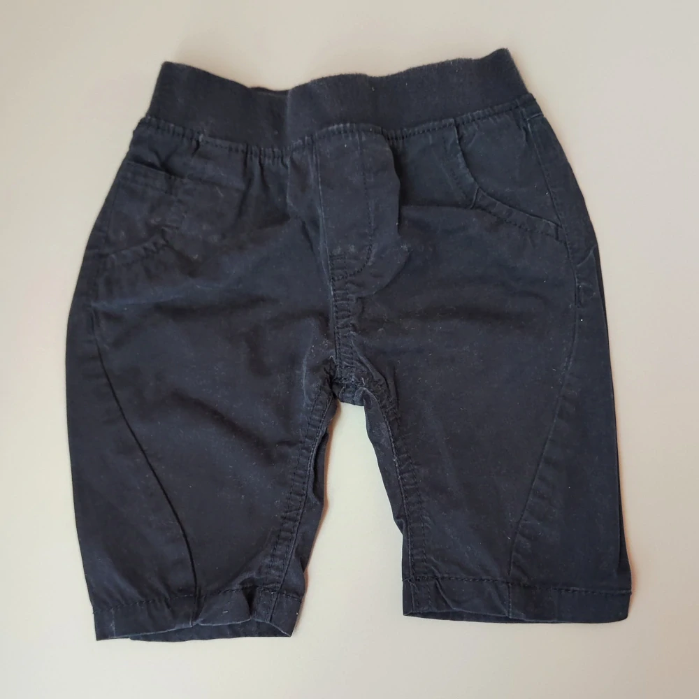 Plátěné kalhoty Next vel. 62 navy