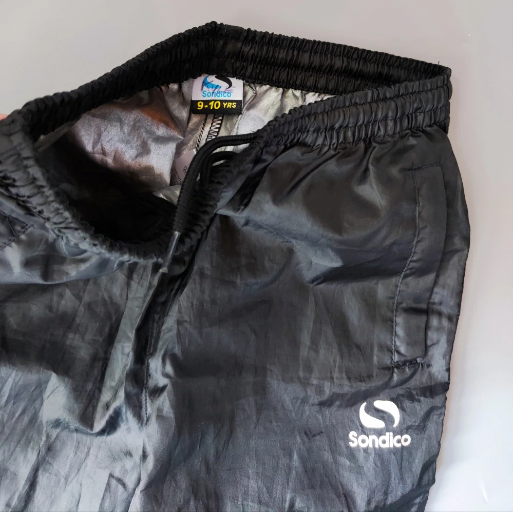 Kalhoty Sondico vel. 140 černé