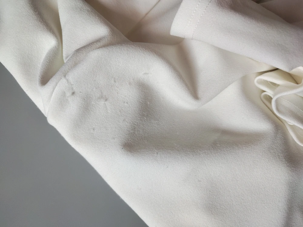 Bílý kalhotový overal New Look vel. 38