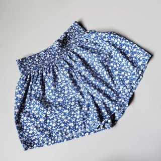 Modré květované kraťasy Shein vel. 140