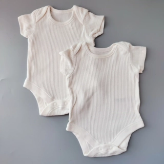 Set dvou žebrovaných body Nutmeg vel. Newborn krémová