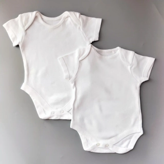 Set dvou bílých body Next vel. 62 krátký rukáv