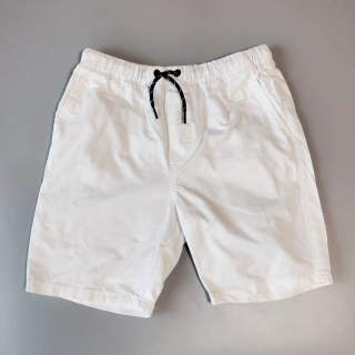 Plátěné kraťasy Next vel. 140 bílé