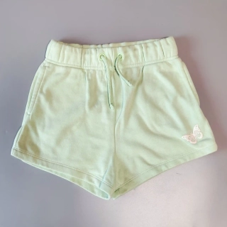 Teplákové kraťasy George vel. 134 mátové s motýlkem